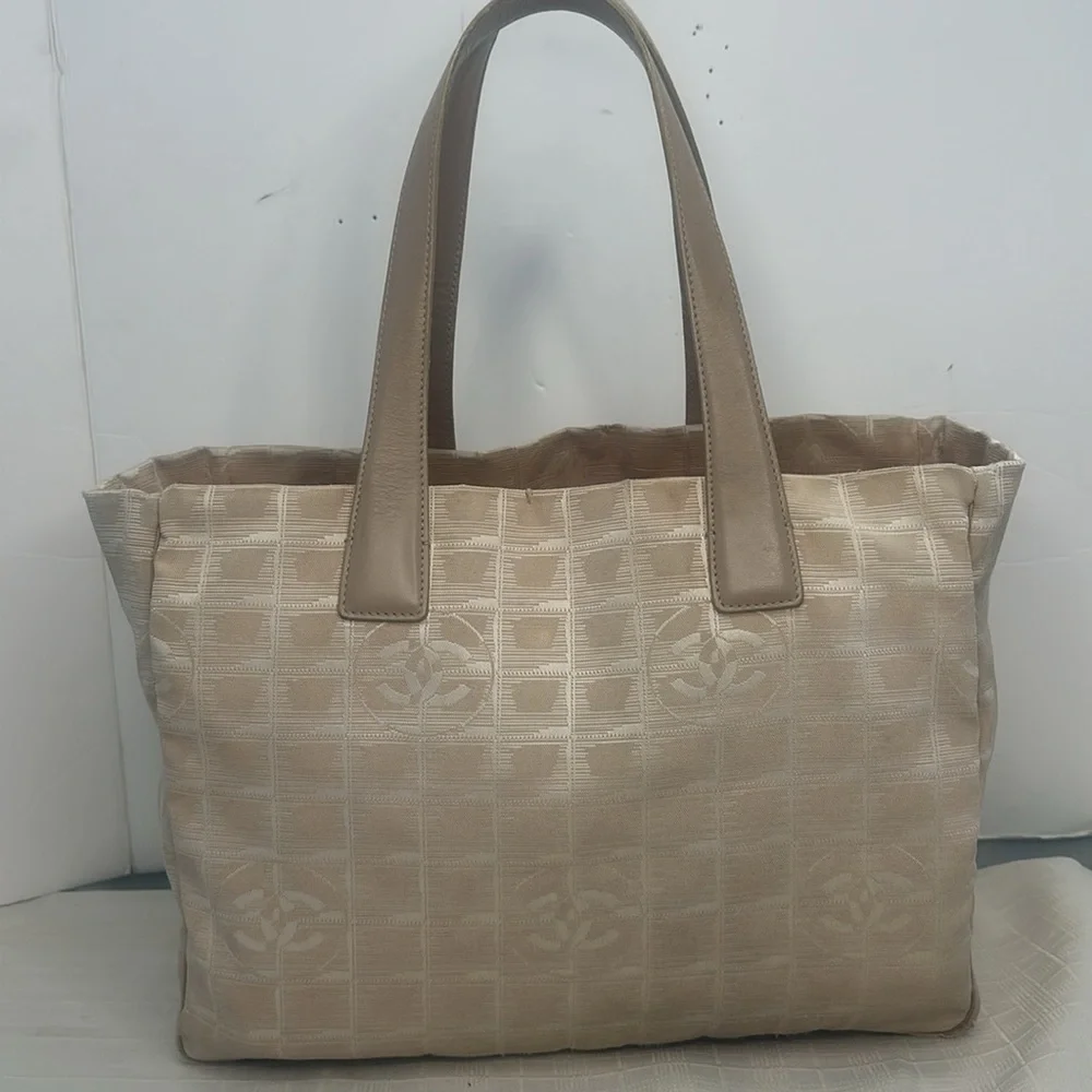 Chanel Travel Line tote in light beige / pale pinkish canvas